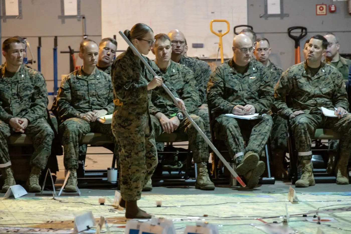 Marines planning over a map